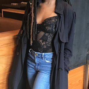 Pink plastic body suit